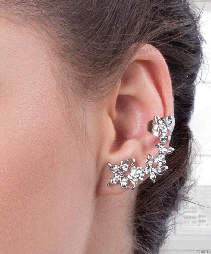 Cercei tip "ear cuff" cu cristale albe şi metal argintiu în formă de fluturi, o pereche